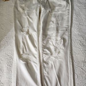 Women's jeans tattered and great fit with lycra.  Love these .